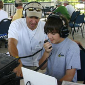 Full Licensee helping youngster to get on the air.